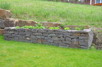 Natursteinmauern für Beeteinfassung
